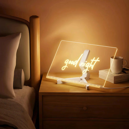 Quadro luminoso decorativo com escrita 'good night' em mesa de cabeceira, ambiente aconchegante